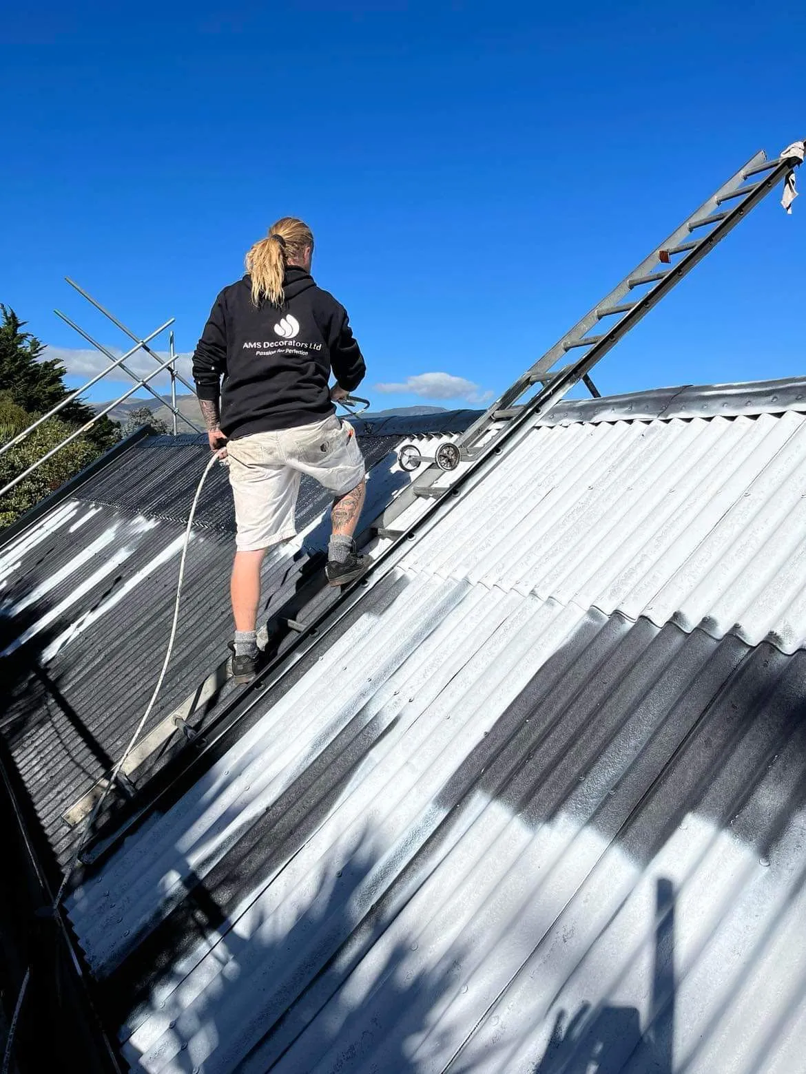 Corrugated iron roof recoat
